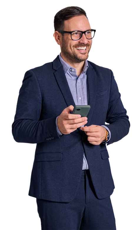 Smiling businessman on his phone