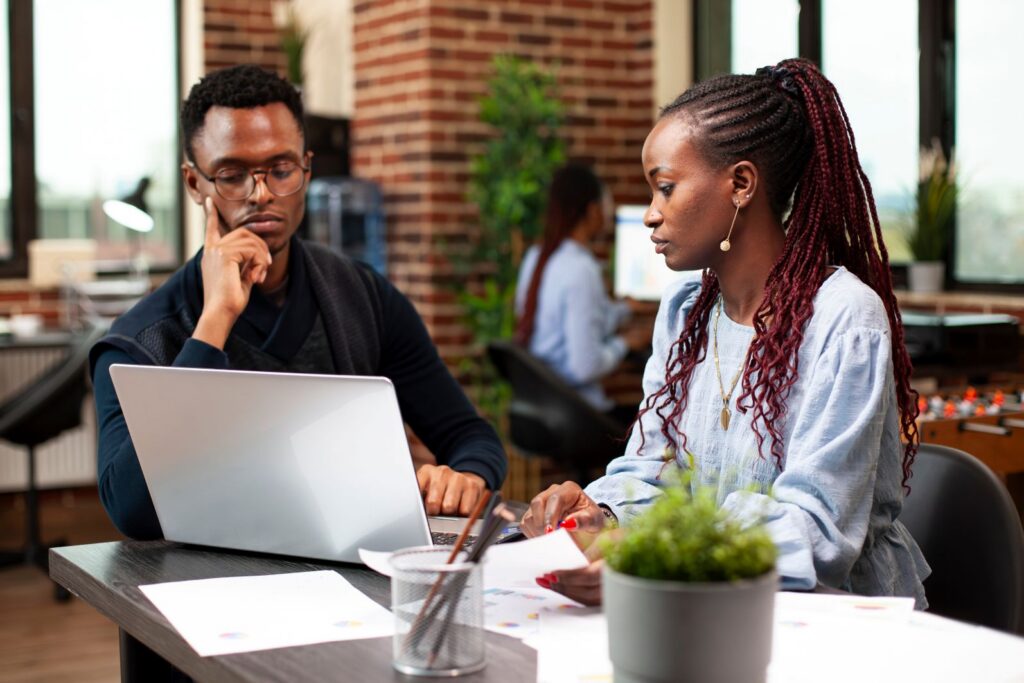 Couple working together on their budgeting plans